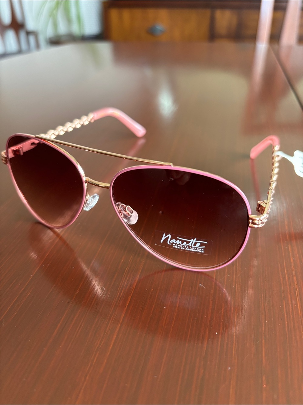 Nanette Lepore 100% UV protection gold-tone & link metal frame,pink lens,CAT 2